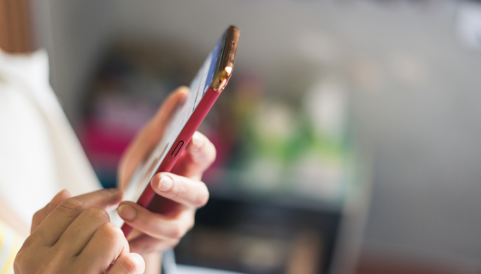 person holding a mobile device