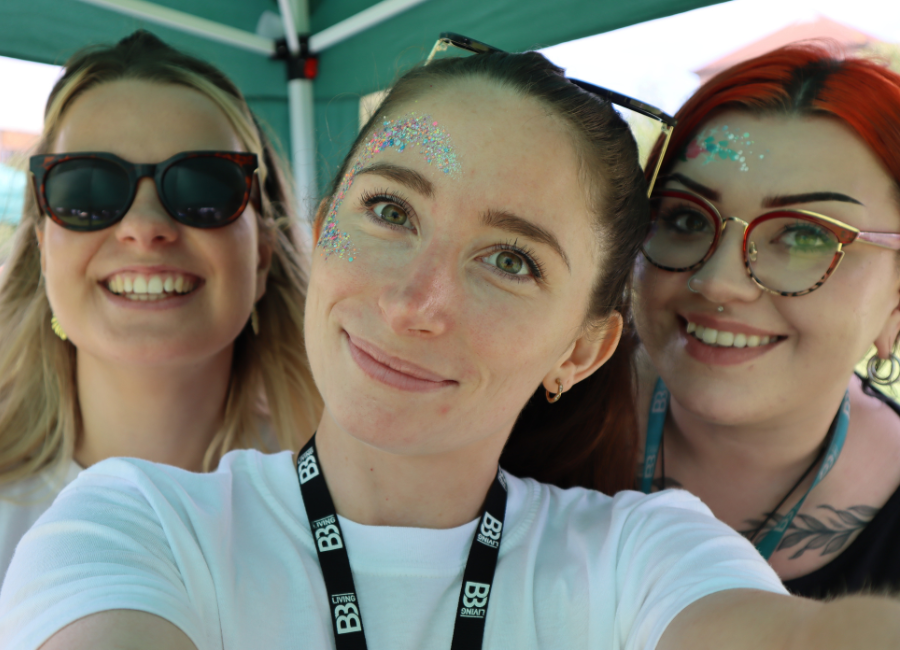 3 young females attending an event